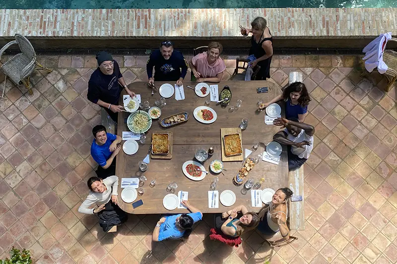 Your-stay-event-group-at-pool-eating2